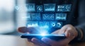 Futuristic smartphone interface displays interactive data visualizations and analytics in a modern office setting Royalty Free Stock Photo