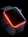 Smartwatch glowing red light on dark background Royalty Free Stock Photo