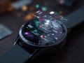 Futuristic smartwatch with holographic interface and digital display apps Royalty Free Stock Photo