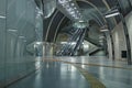 Futuristic subway station with guiding lines and an escalator near Heumarkt in Cologne, Germany