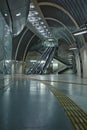 Futuristic subway station with guiding lines and an escalator near Heumarkt in Cologne, Germany