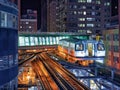 Futuristic subway train in neonlit city