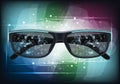 Futuristic sunglasses feature a sleek, black frame with digital, geometric patterns displayed on Royalty Free Stock Photo