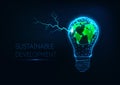 Futuristic sustainable energy concept with glow low polygonal light bulb, Earth map and lightning. Royalty Free Stock Photo