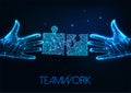 Futuristic teamwork, problem solution concept with glowing two human hands and puzzle pieces Royalty Free Stock Photo