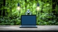 Futuristic tech concept with laptop and robot in nature setting Royalty Free Stock Photo