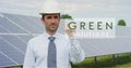 A futuristic technical expert in solar photovoltaic panels, selects the `Green solution` function using pure renewable energy. The