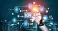 Futuristic Technology Concept with Hand Touching KPI Dashboard and Performance Metrics Visuals in a Digital Corporate Royalty Free Stock Photo