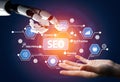 Futuristic Technology Interaction Between Robot Hand and Human Hand with SEO Elements and Data Mining Visuals in Royalty Free Stock Photo