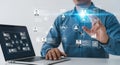 Futuristic technology man interacting with digital interface and laptop ai data network Royalty Free Stock Photo