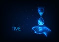 Futuristic time, deadline, time management concept with glowing low polygonal hand holding hourglass