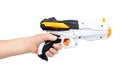 Futuristic toy gun with kid hand, isolated on white background Royalty Free Stock Photo