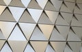 Futuristic Wall of relief metallic triangles. 3d geometric background Royalty Free Stock Photo