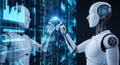 Futuristic white humanoid robot interacting with blue digital data wall Royalty Free Stock Photo