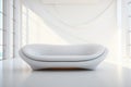 A futuristic white room with a modern sofa and empty wall. Interior design for product presentation.. Minimalist background for Royalty Free Stock Photo