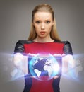 Futuristic woman with tablet pc