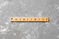 Futuristic word written on wood block. Futuristic text on cement table for your desing, concept Royalty Free Stock Photo