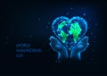 Futuristic World Humanitarian Day concept with glowing low polygonal hands holding planet earth inside heart shape Royalty Free Stock Photo