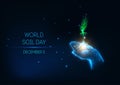 Futuristic World Soil Day concept with glow low poly hand hold green sprout on dark blue background