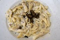 fuzi istrian pasta with black truffle tartufo mashroom and cream traditional food in Rovinj Croatia Royalty Free Stock Photo