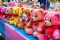 fuzzy teddy bear prizes at a game stall