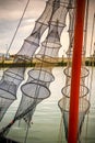 Fyke nets hanging down to dry on a fishing trawler Royalty Free Stock Photo