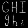 G, h, i handwritten white chalk letters isolated on black background