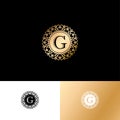 G letter or monogram. The original gold G letter symbol in a circle with lace ornament.