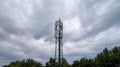 3G, 4G, 5G. Mobile phone base station Tower. Development of communication system in npn-urban forest area with dark