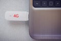 4G modem connected in modern notebook closeup. Royalty Free Stock Photo