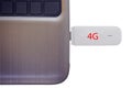 4G modem connected in modern notebook closeup isolated on white background. Royalty Free Stock Photo