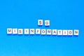 5 g mystification. 5 G. Five G`s, written in wooden letters on a blue background. top view. Flat layout. Wireless Royalty Free Stock Photo