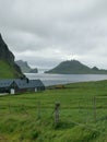 GÃ¡sadalur village in a cloudy summer day, Vagar, Faroe Islands Royalty Free Stock Photo