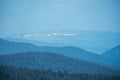 5g signal tower and lots of mountain layers during blue hour