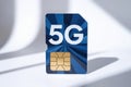 5G SIM card representing fast mobile network technology future telecommunication standard global connectivity solution Royalty Free Stock Photo