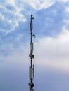 5G telephone antenna pole isolated on stormy sky Royalty Free Stock Photo