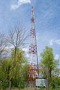 4G TV radio tower with parabolic antenna and satellite dish. Broadcast network signal. High coverage area. Royalty Free Stock Photo