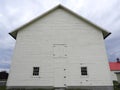 Gable barn side of Shaker white livestock barn at Watervliet Royalty Free Stock Photo