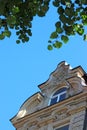 Gable of a baroque house with window, blue sky