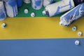 Gabon flag and few used aerosol spray cans for graffiti painting. Street art culture concept