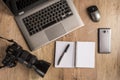 Top view of different gadgets and devices on the table: pc, computer, pen, note book, keypad, pencil, notebook, mouse. Royalty Free Stock Photo