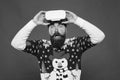 Gadgets review. Techno blogger. Bearded hipster play game vr. Merry christmas. Cyber gaming. Virtual achievement. Future Royalty Free Stock Photo