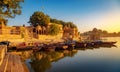 Gadisar Lake at Jaisalmer with ancient archaeological ruins at sunrise at Rajasthan, India