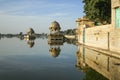 Gadi Sagar temple on Gadisar lake with reflection.