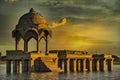 Gadi Sagar temple on Gadisar lake at sunset, Jaisalmer, India.