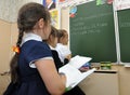 Children write off their homework from the board Royalty Free Stock Photo