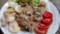 Gado gado is a food in the form of vegetables and other ingredients such as rice cake, tofu and tempeh doused in peanut sauce. Royalty Free Stock Photo