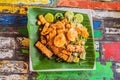 Gado-gado Indonesian salad served with peanut sauce. Ingredients: tofu, spinach, string beans, soy sprouts, potatoes