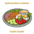 Gado-gado is a typical Indonesian salad containing boiled vegetables and potatoes, boiled eggs, fried tofu tempeh and lontong,