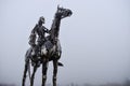 The Gaelic Chieftain Sculpture looking heroic while surrounded by fog near Boyle in County Roscommon in Ireland